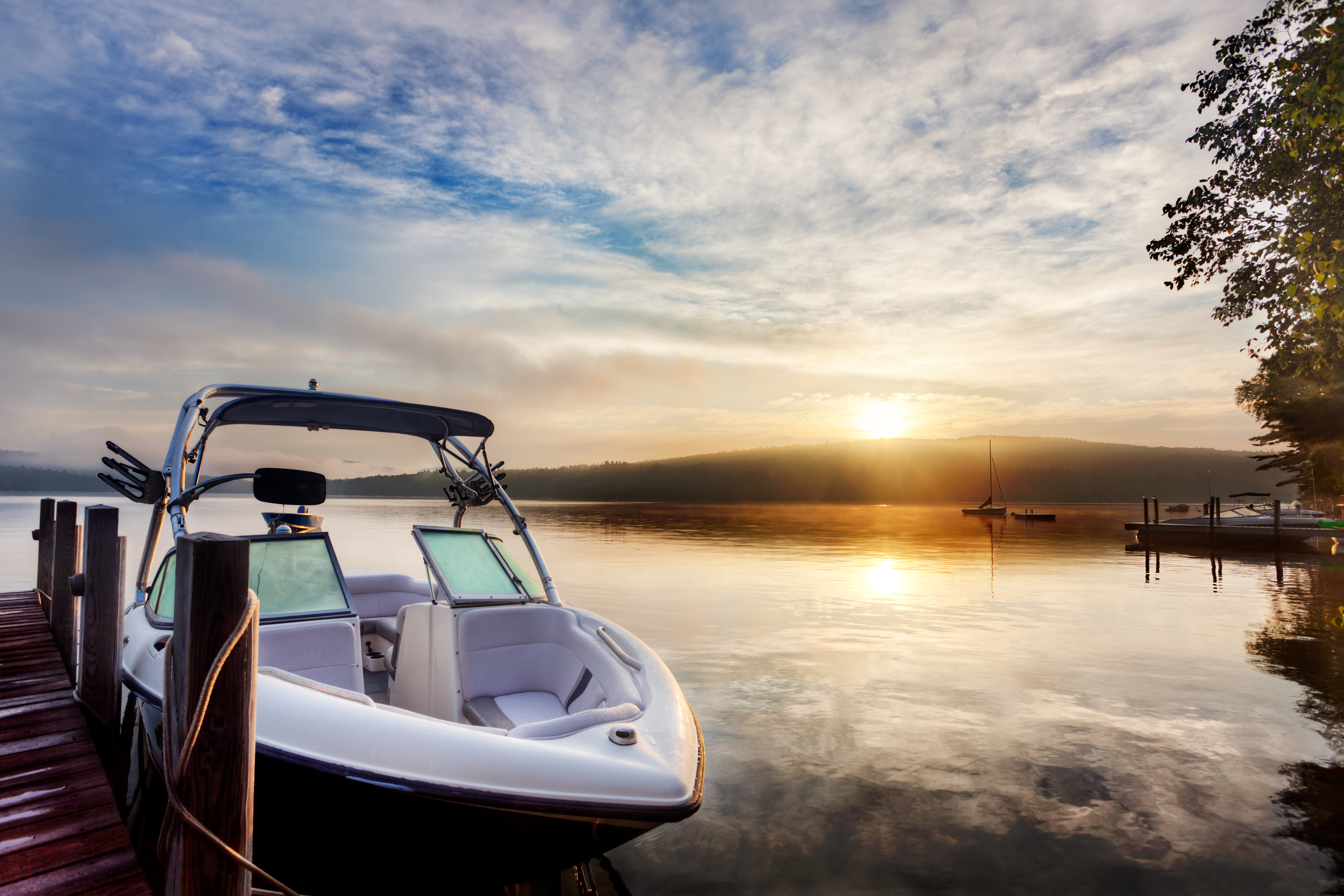 A boat at the dock at sunset, prevent a boat launch failure concept. 