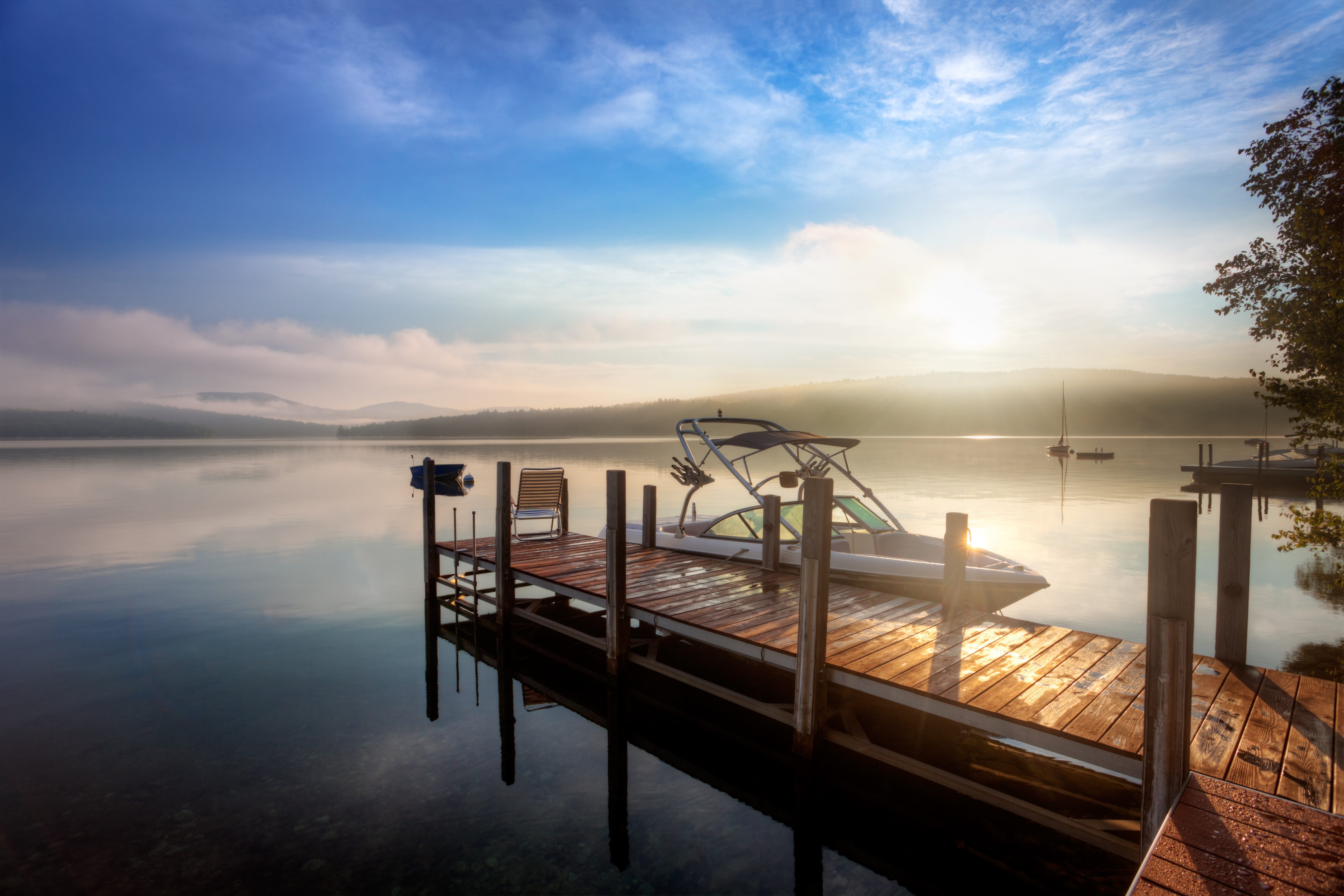 A boat at a dock, planning storage for a boat-sharing agreement. 