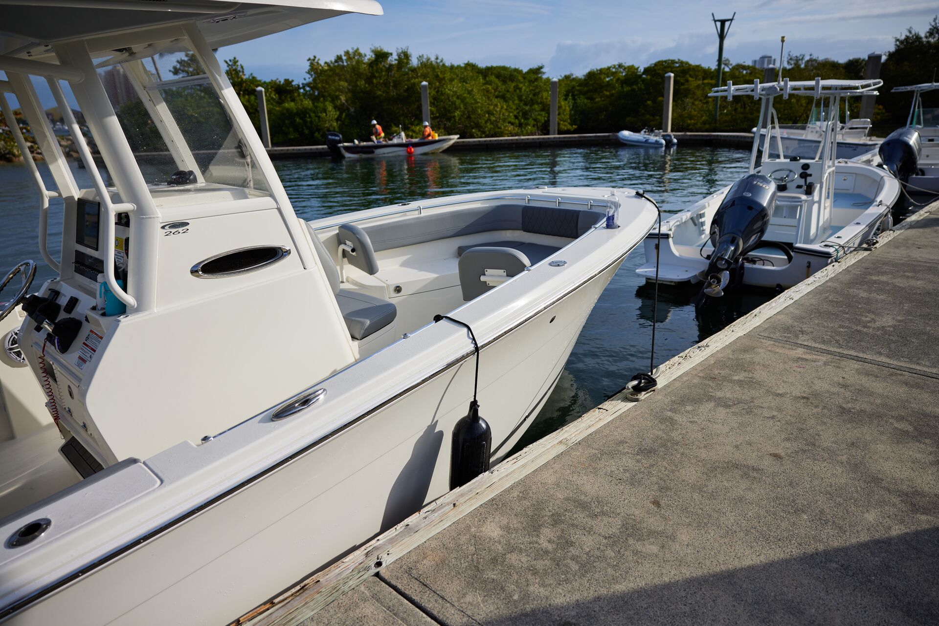 Boats tied to dock, what to do during gale force winds concept. 