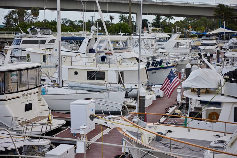 Many boats docked at a marina, learn boat terminology to operate a boat safely concept. 