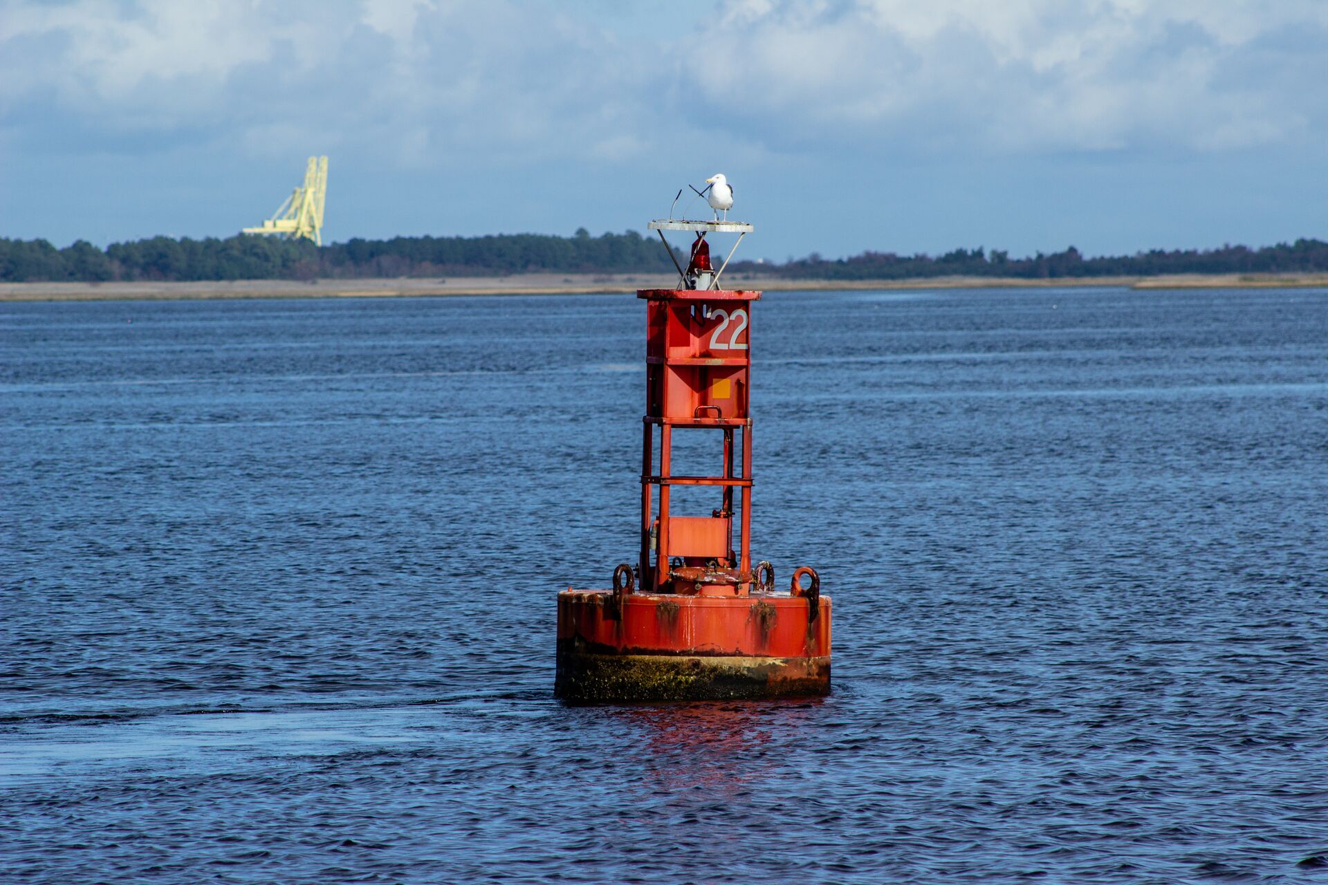 Red channel marker on the water, understand boating navigation markers concept. 