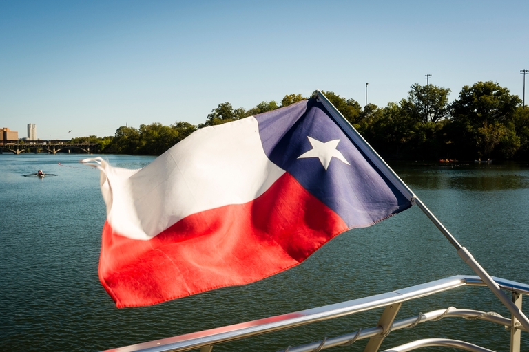 Texas flag on a boat, get a Texas boating license concept. 