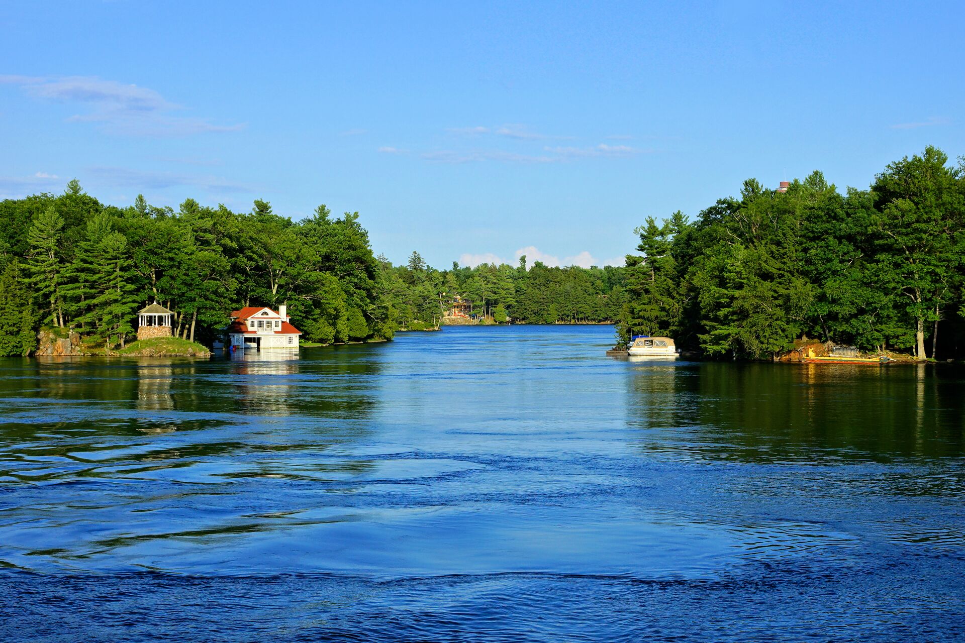Canadian waterway with cottages along shore, port authorities in Canada concept.