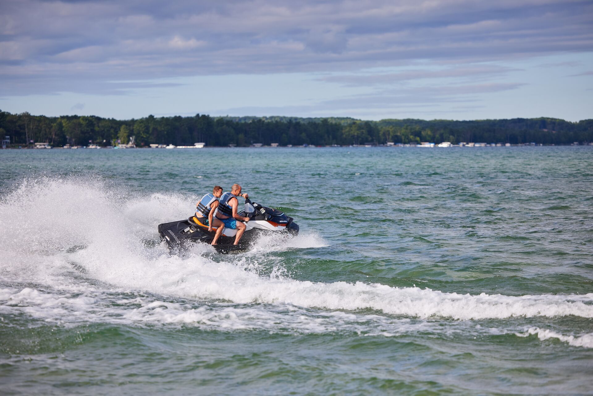 Two people on a PWC, know the boating license requirements concept. 