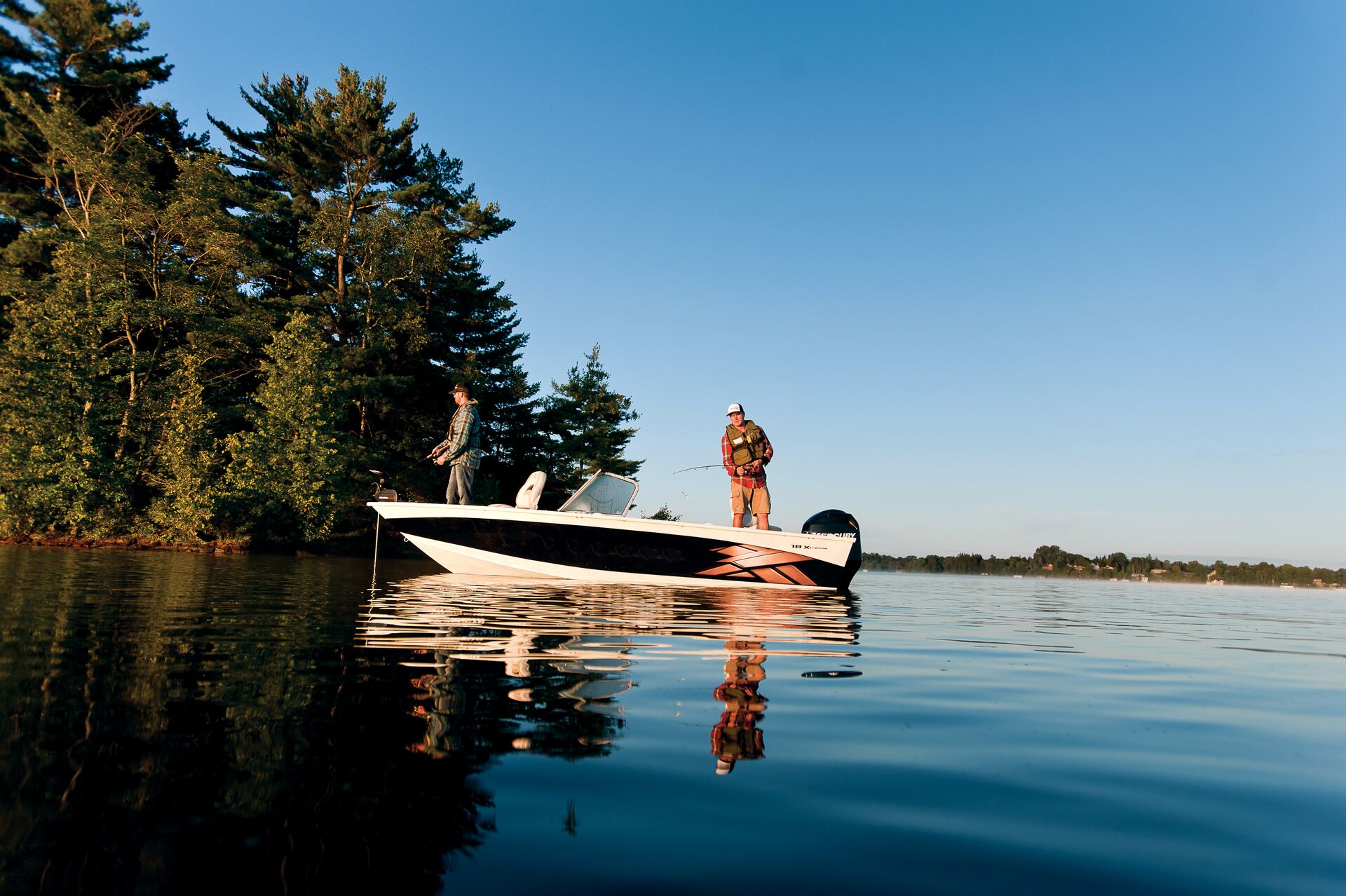 Two people fishing from a boat on a lake, registering a boat concept. 