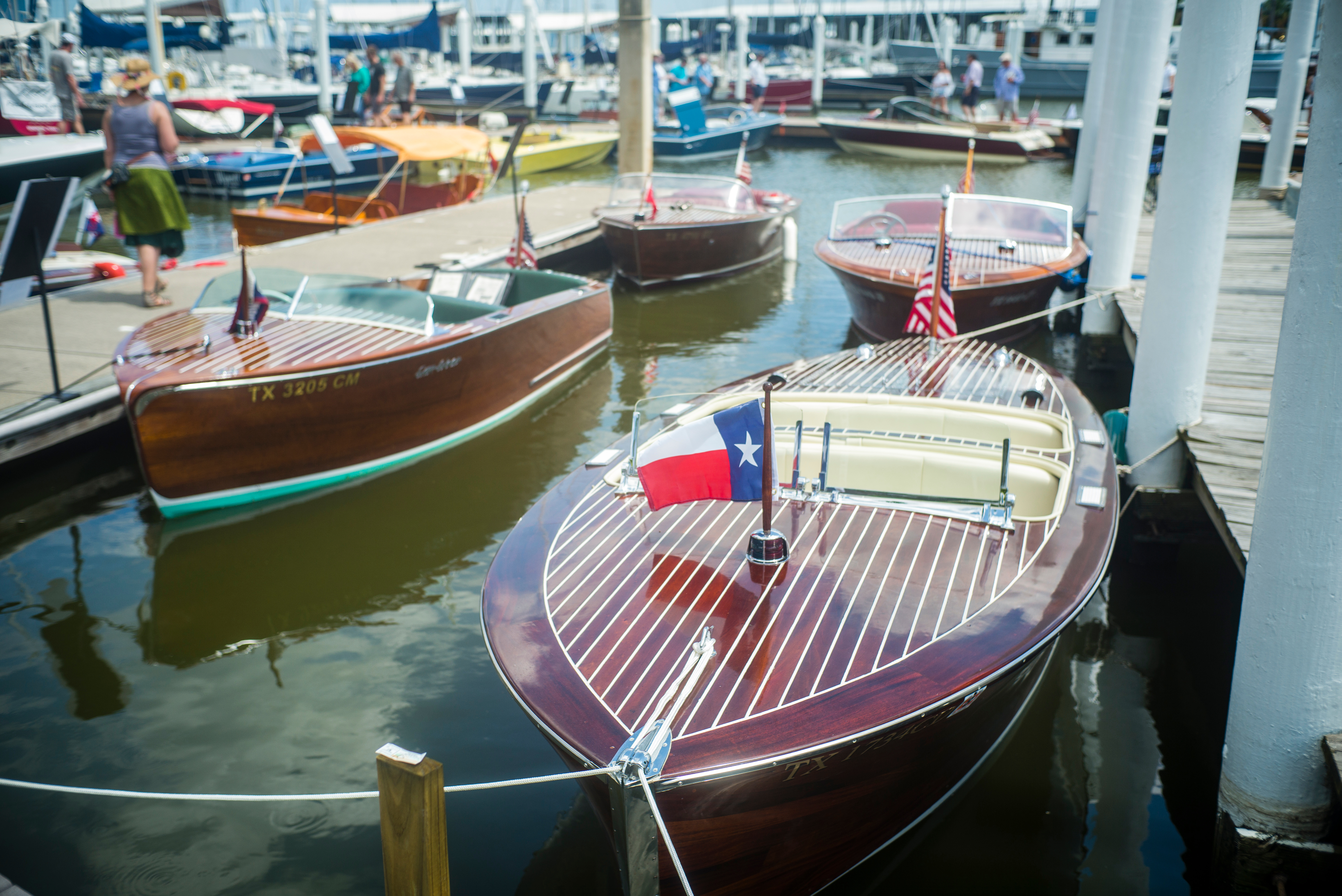 Texas flag on a boat at the dock, do you need a boating license in Texas concept. 
