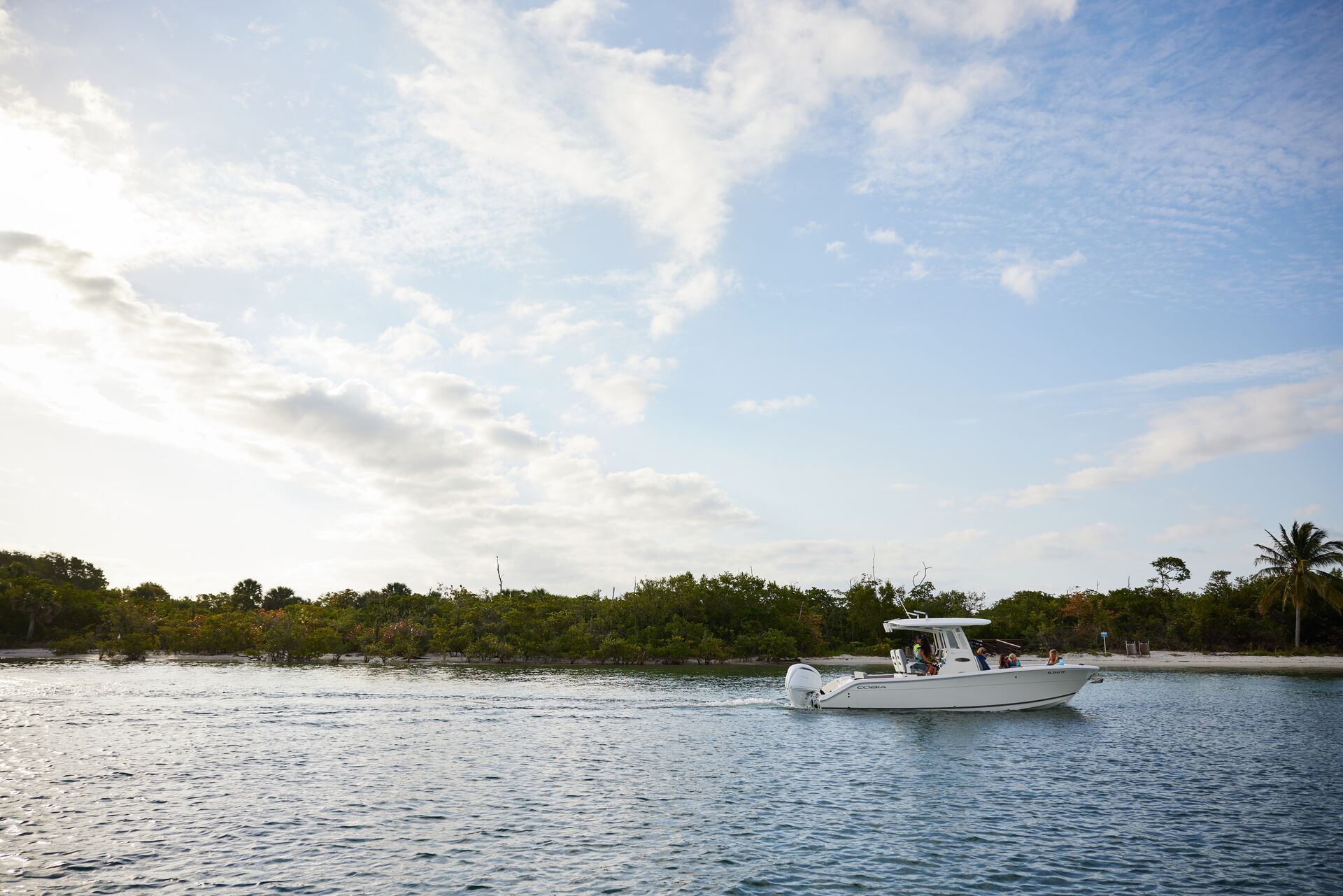 Boat near shoreline, do you need a boating license in Florida concept. 