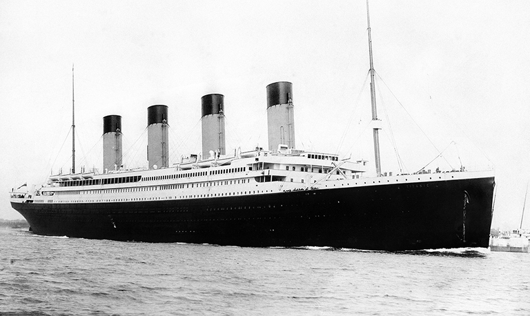 A black and white photo of the Titanic, world's most famous ships concept. 
