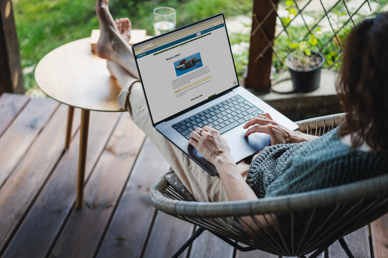 Woman taking a boater education course on a laptop, is Boat-Ed official accredited concept.