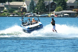 Boat pulling waterskier, summer boating checklist concept.