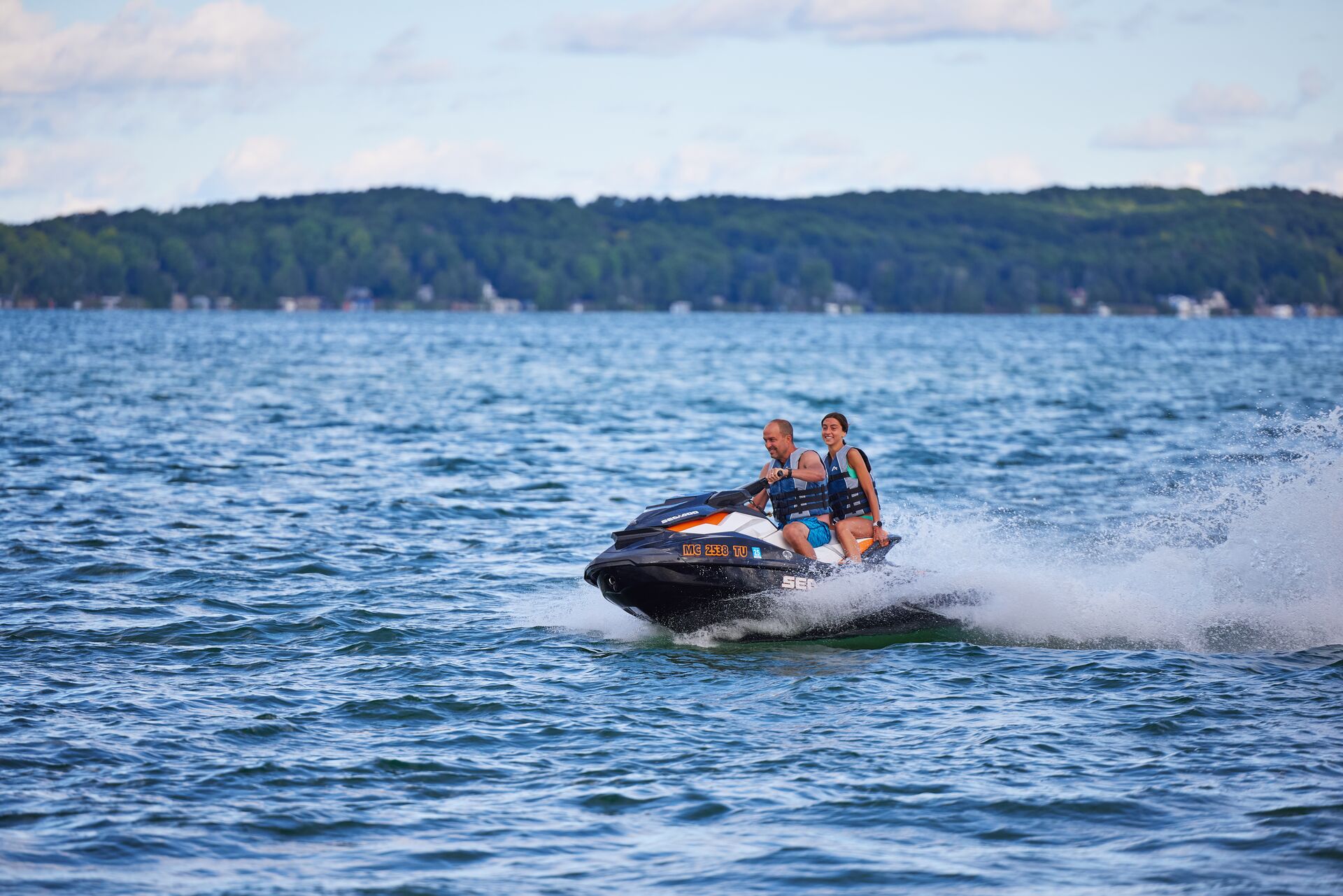 Dad with girl on PWC, do you need a boating license to rent a boat or PWC in PA concept. 