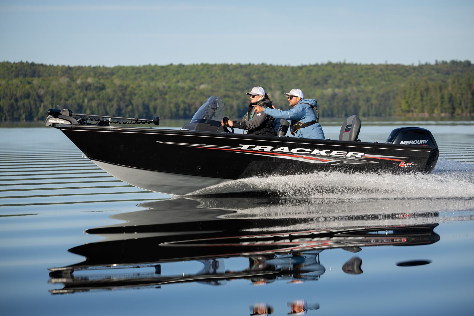 Instructor with student in black bass boat, boat rental Pennsylvania concept.