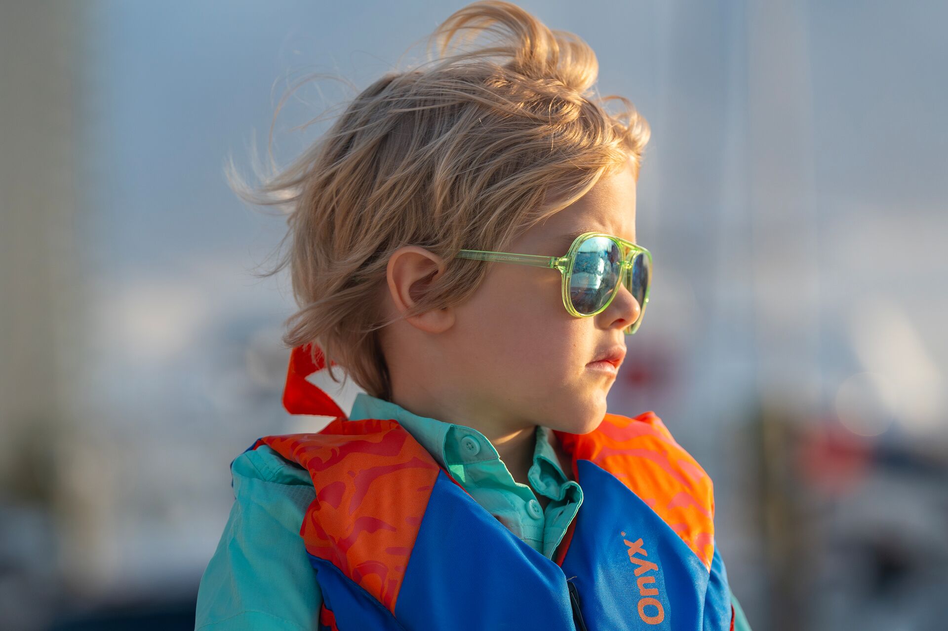 A child wearing a life jacket on a boat, Type 1 life jacket concept. 